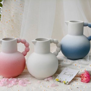 Bình gốm quai chuỗi ngọc